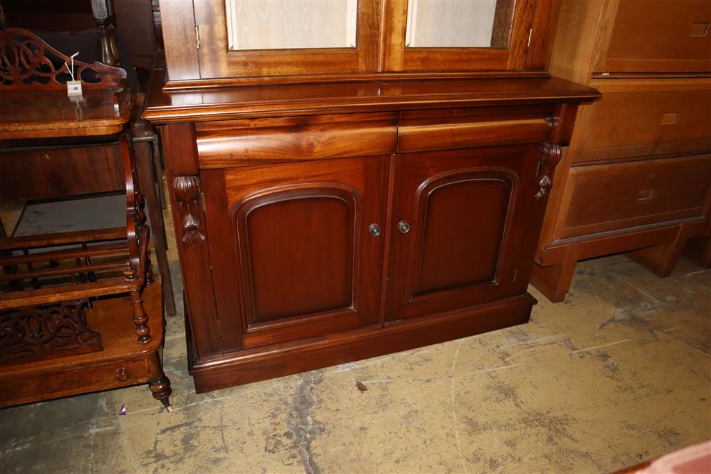 A pair of Victorian style mahogany bookcases, width 125cm, depth 50cm, height 218cm